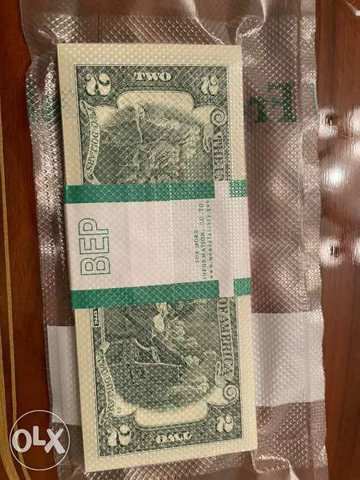 2 dollar bills. Uncirculated 100x consecutive numbered bills 1