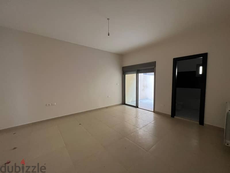 L13978-A Deluxe Apartment With Backyard For Sale In Kfarhbeib 1
