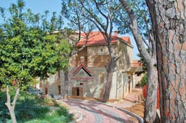 Escape the Ordinary! Elegant Villa for sale in Souk El Gharb 0