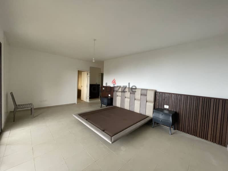 RWK159JS - Apartment For Sale in Ballouneh - شقة للبيع في بلونة 9