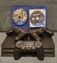 SONY PS4 PRO with 3 original controllers+ FiFa 17 + FiFa 22