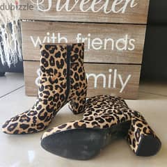 nine west leopard boots 0
