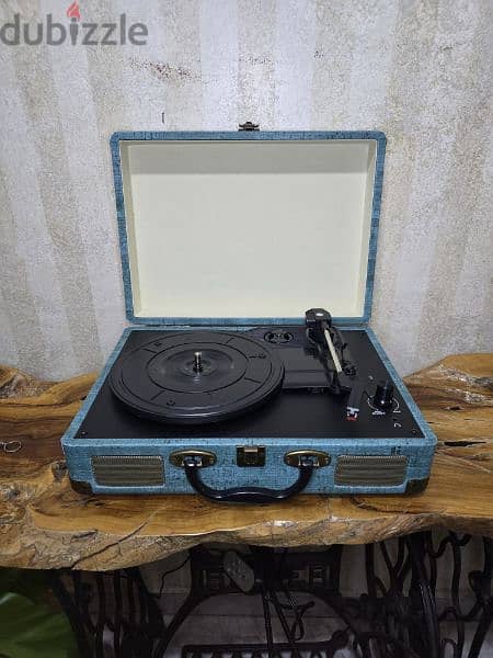 Turntable,  vinyl record player 
مشغل اسطوانات 1