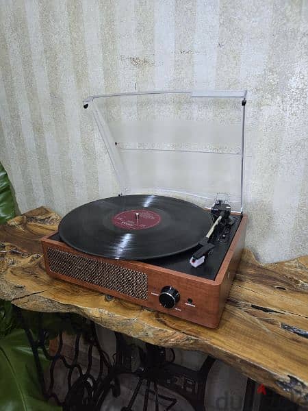 Turntable,  vinyl record player 
مشغل اسطوانات 3