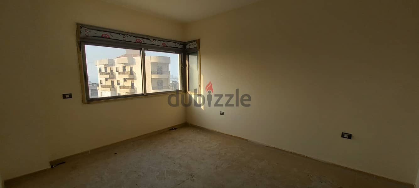 RWK240EM - Apartment For Sale In Haret Sakher - شقة للبيع في حارة صخر 1