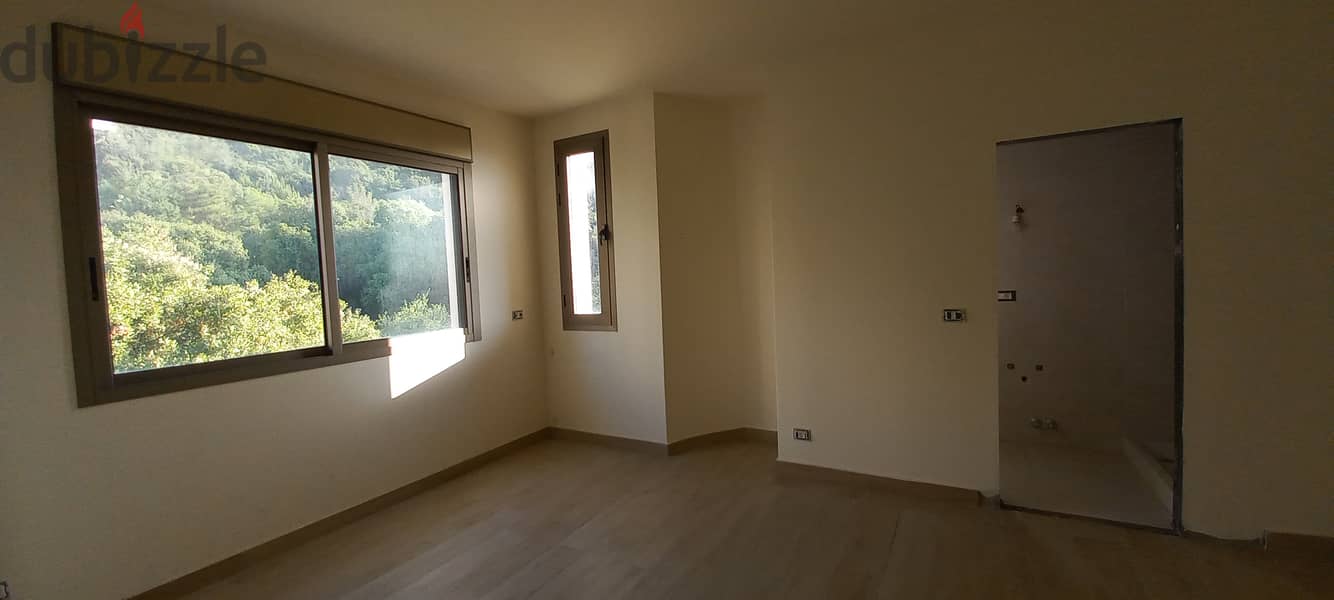 RWK244EM - Apartment For Sale in Haret Sakher - شقة للبيع في حارة صخر 1
