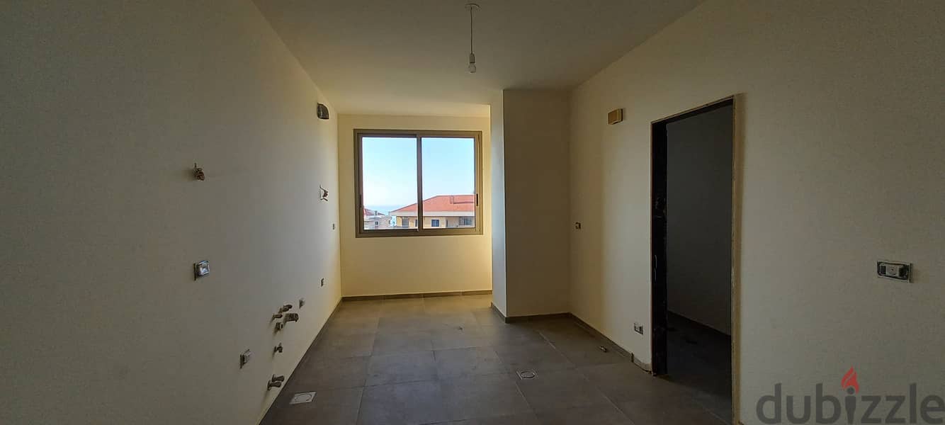 RWK244EM - Apartment For Sale in Haret Sakher - شقة للبيع في حارة صخر 2