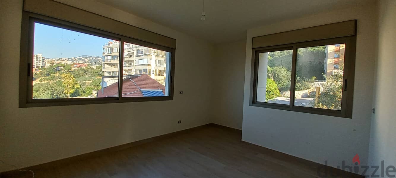 RWK244EM - Apartment For Sale in Haret Sakher - شقة للبيع في حارة صخر 3