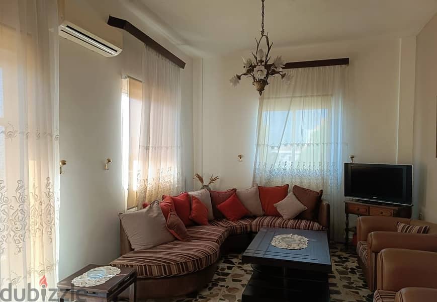 FURNISHED apartment for rent in AMCHIT/JBEIL, with a mountain view. 9