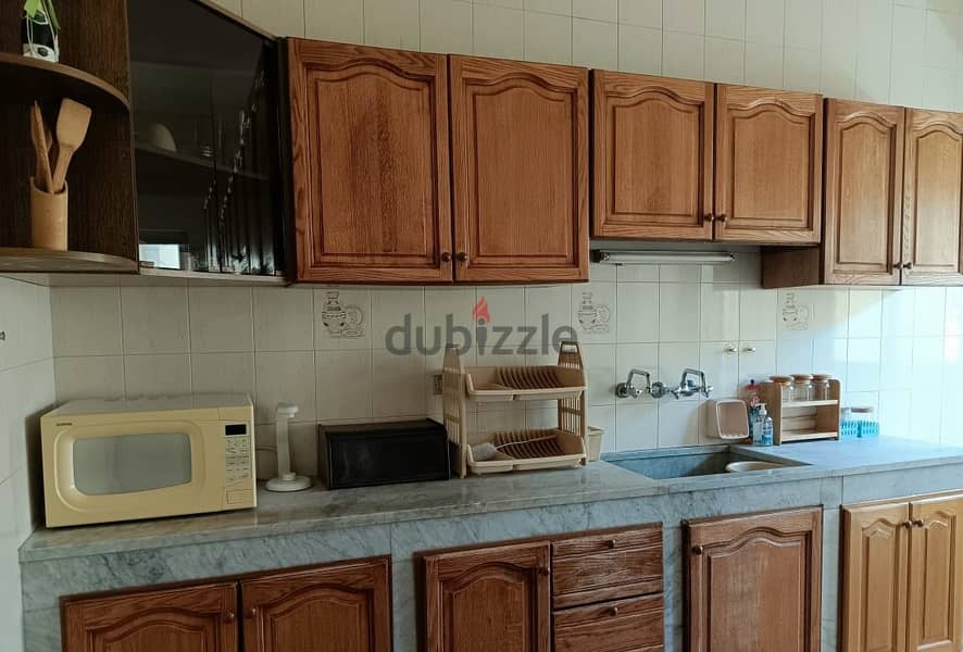 FURNISHED apartment for rent in AMCHIT/JBEIL, with a mountain view. 11