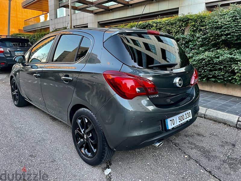 Opel corsa two tone gray black full rims and other options 4