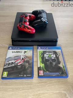 PS4 SLIM with 2 controllers + 2 games