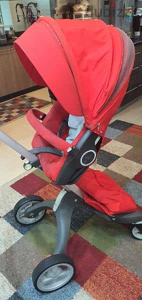 stroller red color (stokke)  &park cam& bath cam for babies. 3