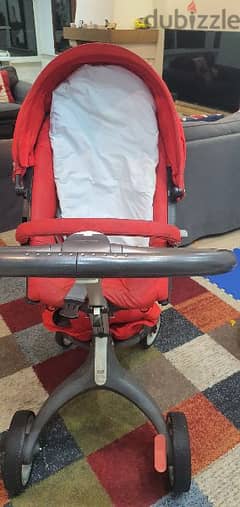 stroller red color (stokke)  &park cam& bath cam for babies. 0