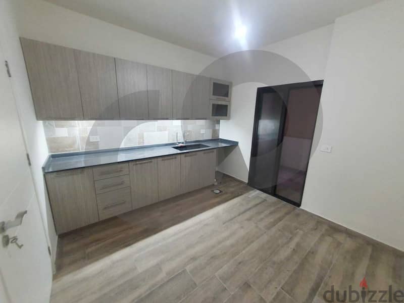 STUNNING APARTMENT LOCATED IN BALLOUNEH IS LSTED FOR SALE REF#KJ00706! 2