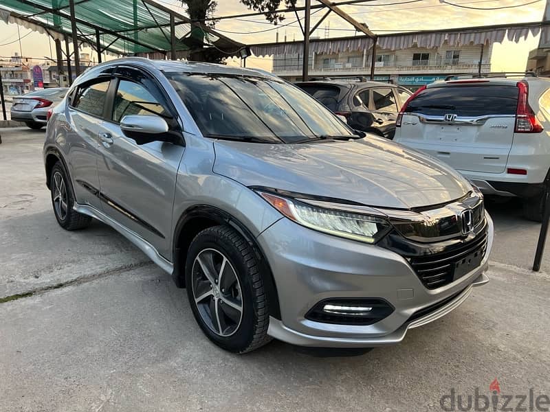 honda HRV AWD touring super clean and law milage 2