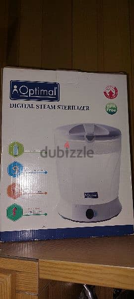 steam sterilizer معقم عبوات حليب بخار 2
