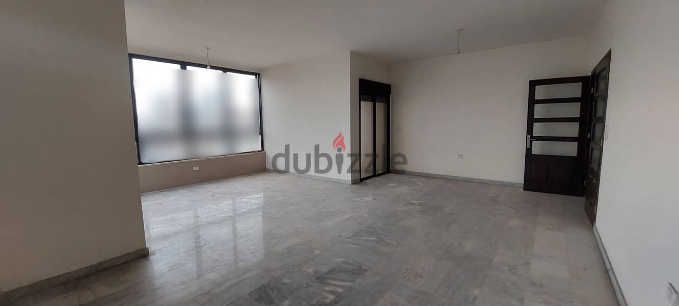 Apartment for sale in Ain El Remmaneh شقة للبيع في عين الرمانه 1