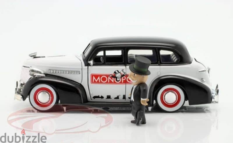 Chevrolet Master Delux (with Mr Monopoly figure) diecast car 1:24. 1