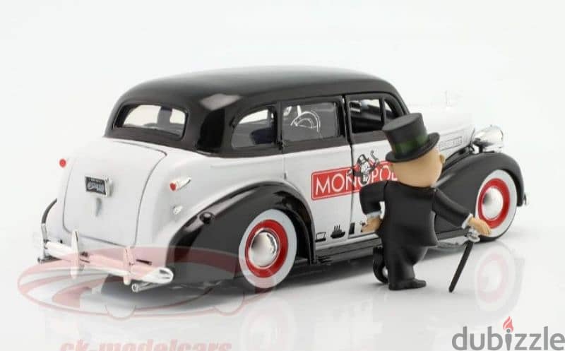 Chevrolet Master Delux (with Mr Monopoly figure) diecast car 1:24. 2