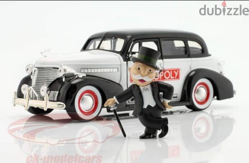 Chevrolet Master Delux (with Mr Monopoly figure) diecast car 1:24. 3