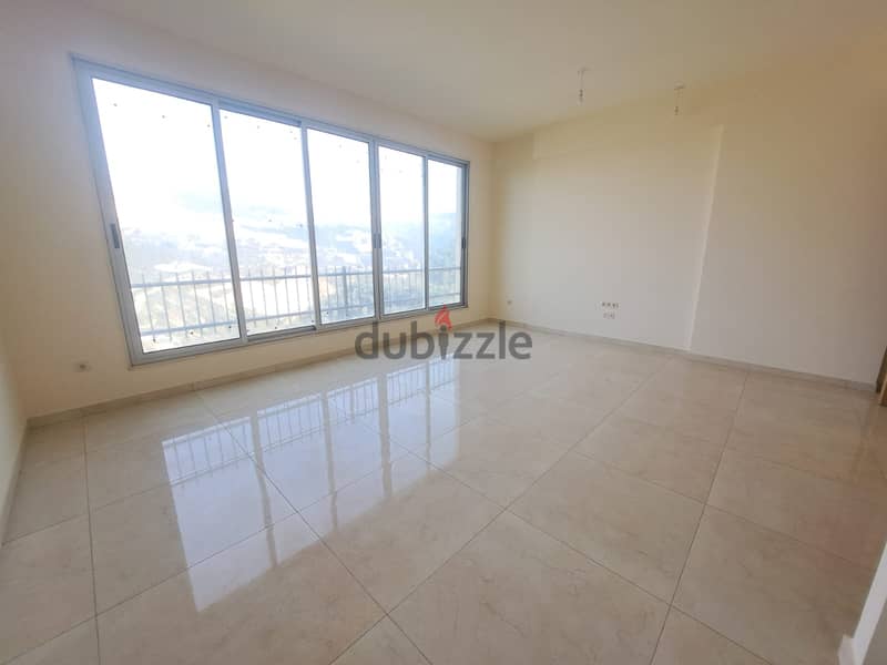 Tranquil Haven with Mountain Views: 3-BR Apartment in Louaizeh 0