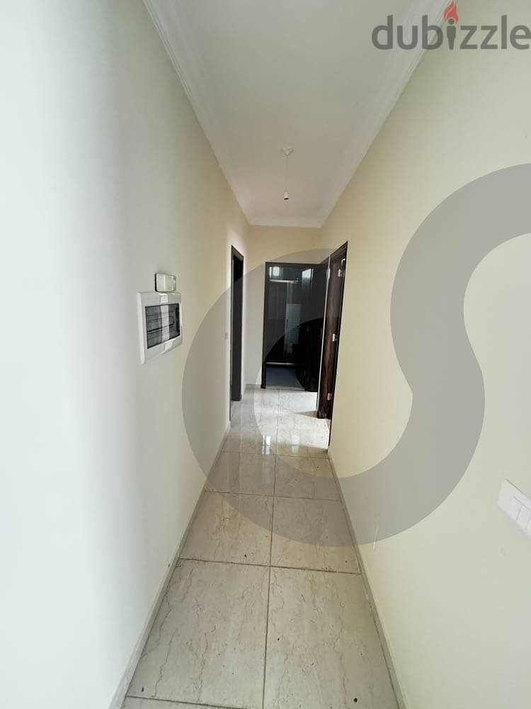 Apartment is for sale in Amchit with terrace/عمشيت REF#NE102268 2