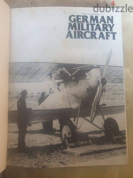 4 books with hardcover about aircraft and automobile 9