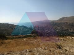 A 2200 m2 land + open mountain view for sale in Tilal El Asal 0