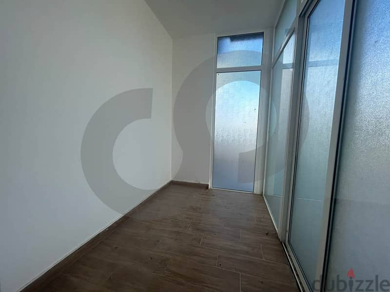Spacious apartment in Jbeil with terrace/جبيل  REF#IN102472 5