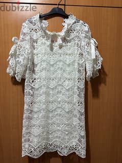 a chic white short sleeve lace dress from italy for baptism or wedding