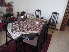 dining table and chairs. Great quality. wood. 6 chairs.