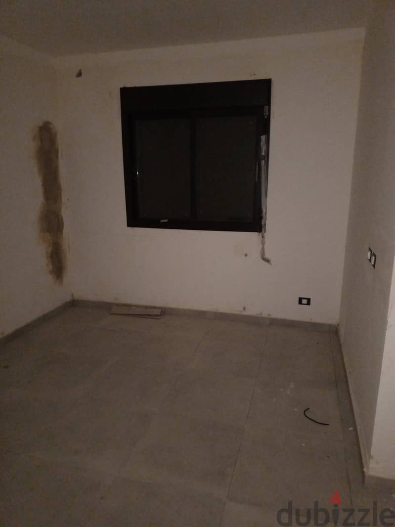 Apartment for sale in Atchaneh شقة للبيع في العطشانة 2