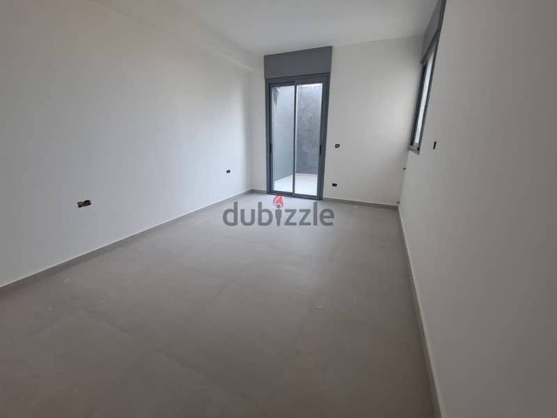 Peaceful Living: Apartment with Scenic Views for Sale in Hazmieh 1