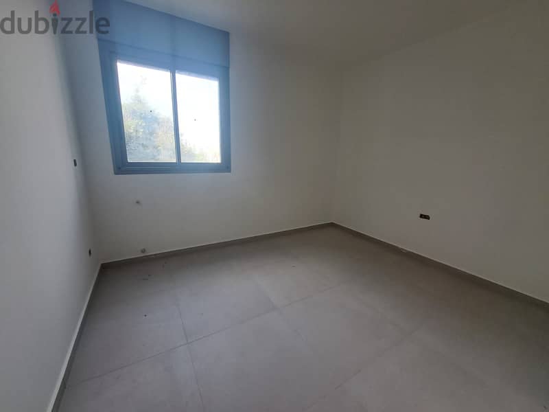 Peaceful Living: Apartment with Scenic Views for Sale in Hazmieh 2