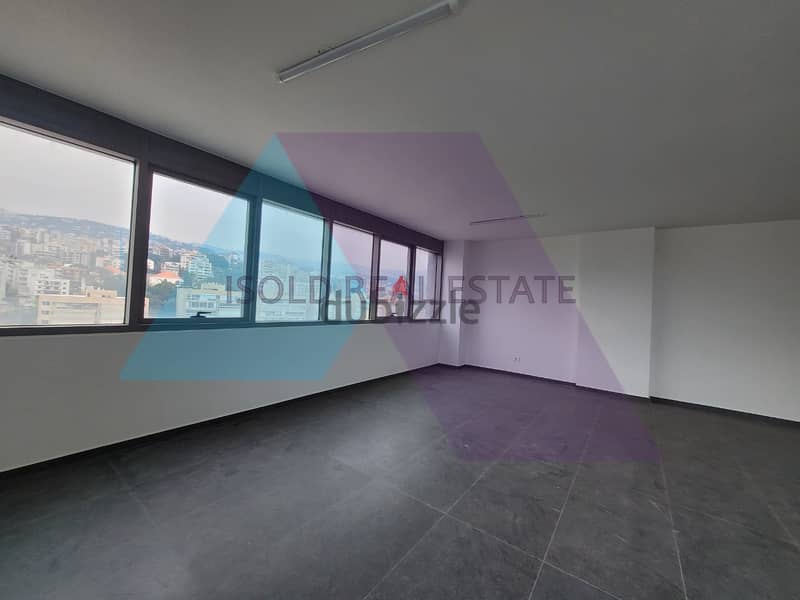 A 90 m2 office having an open sea view for rent in Dbaye 2