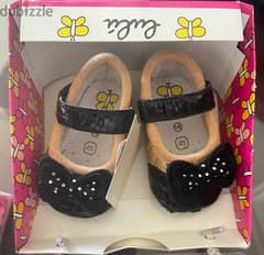size 16 gold and shiny black girl baby shoes