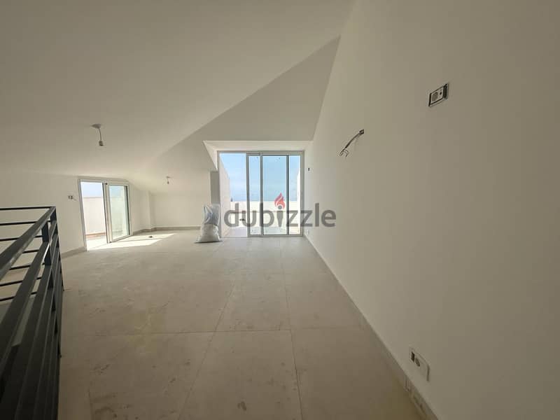 L14890-Apartment With Terrace & Roof for Sale In Jbeil 1