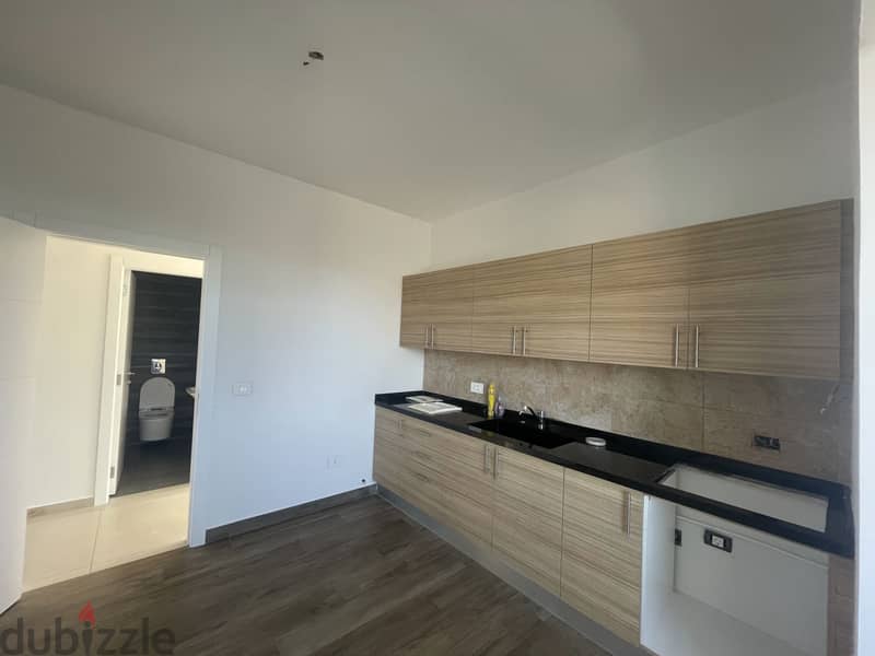 RWK237JS - Apartment For Sale In Ballouneh - شقة للبيع في بلونة 6