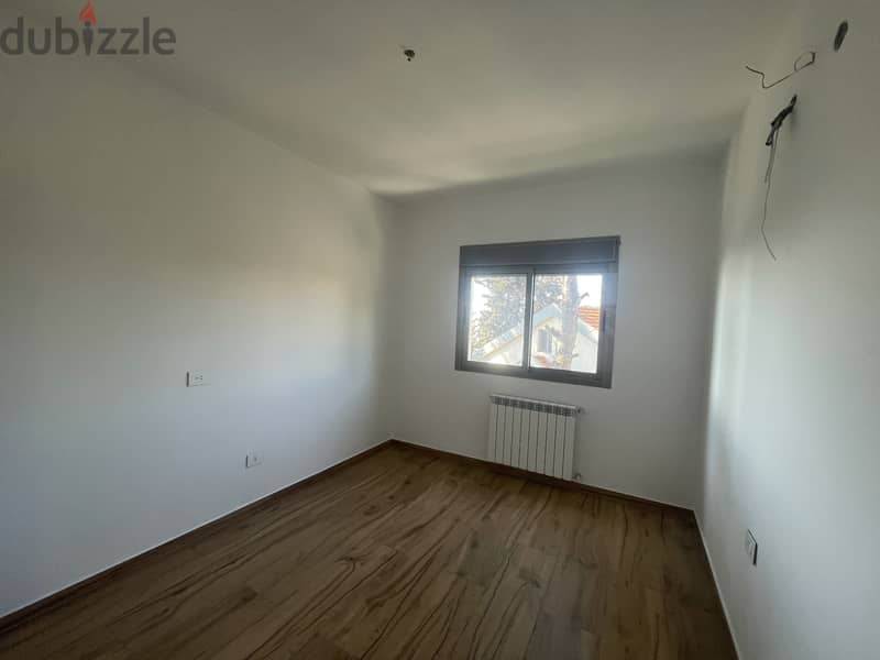 RWK237JS - Apartment For Sale In Ballouneh - شقة للبيع في بلونة 8