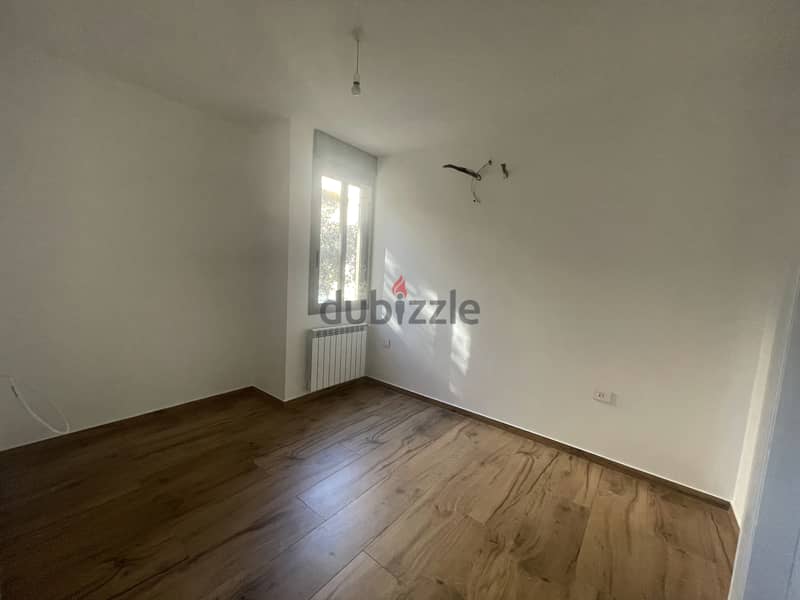 RWK237JS - Apartment For Sale In Ballouneh - شقة للبيع في بلونة 11