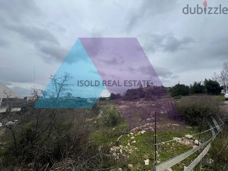 A 3000 m2 land having an open mountain/sea view for sale in Ras osta 1