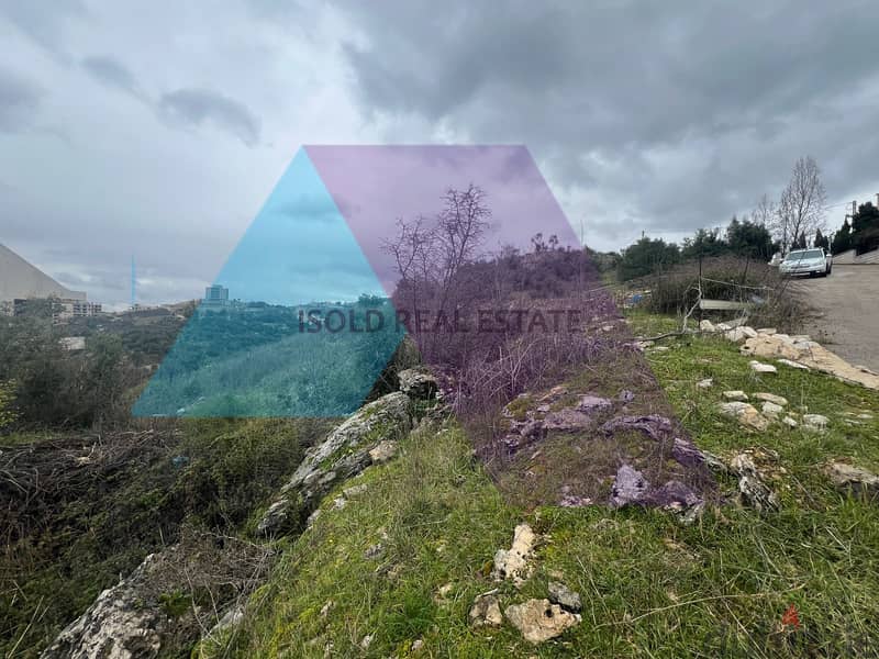 A 3000 m2 land having an open mountain/sea view for sale in Ras osta 2