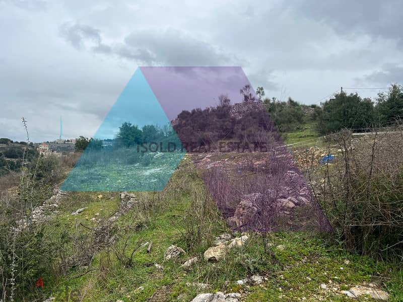 A 3000 m2 land having an open mountain/sea view for sale in Ras osta 3