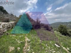 A 7700 m2 land having an open mountain view for sale in Mechmech/Jbeil 0