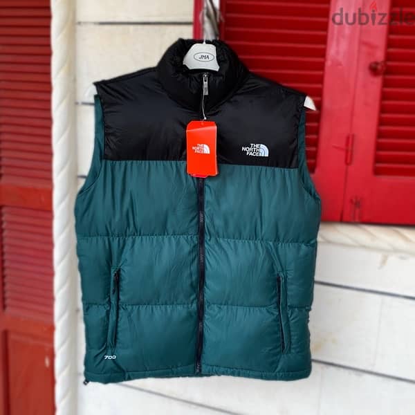 THE NORTH FACE Black & Green Puffy Vest. 1