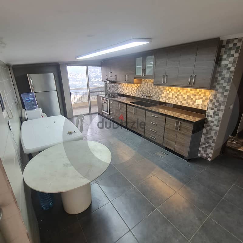 Spacious Apartment with Open Views in Ballouneh/بلونة REF#SA103286 3