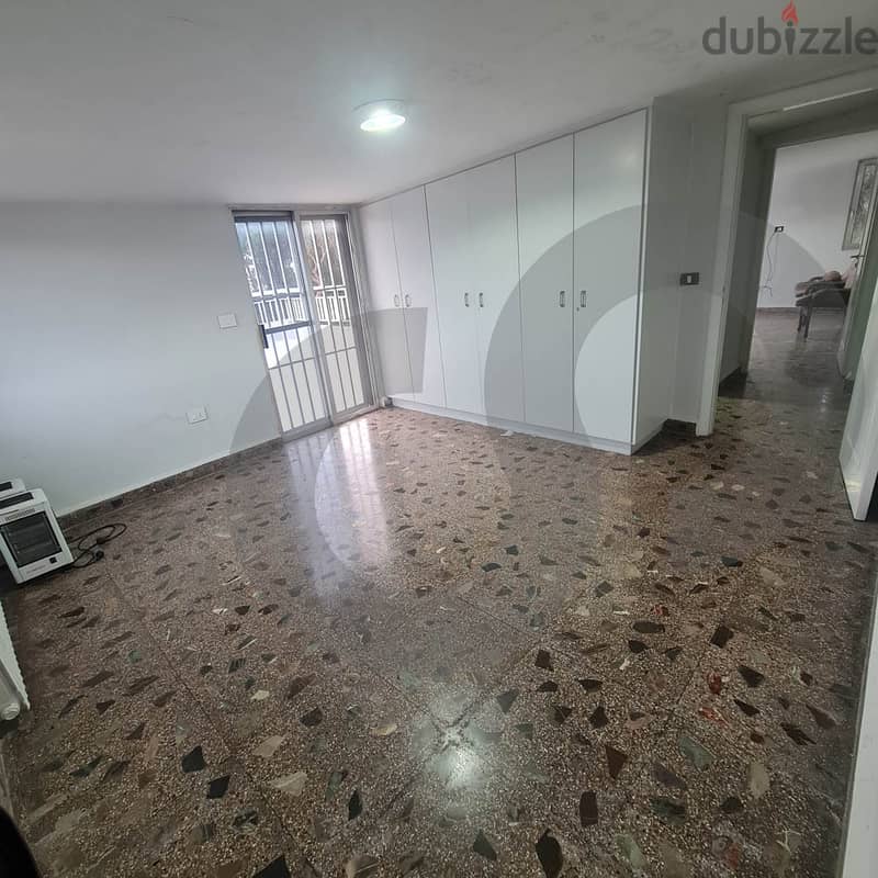 Spacious Apartment with Open Views in Ballouneh/بلونة REF#SA103286 5