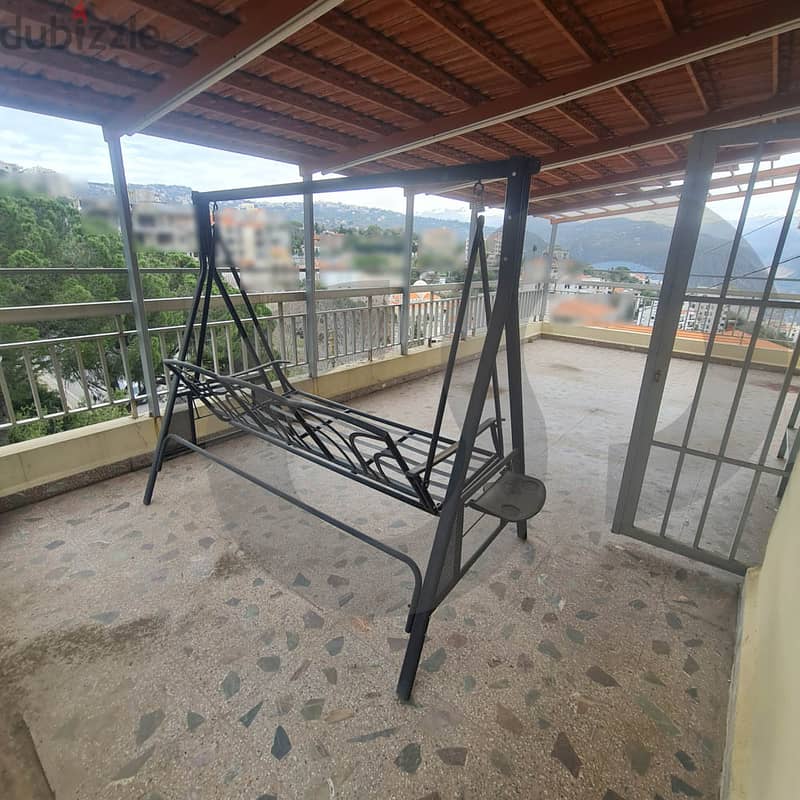 Spacious Apartment with Open Views in Ballouneh/بلونة REF#SA103286 7