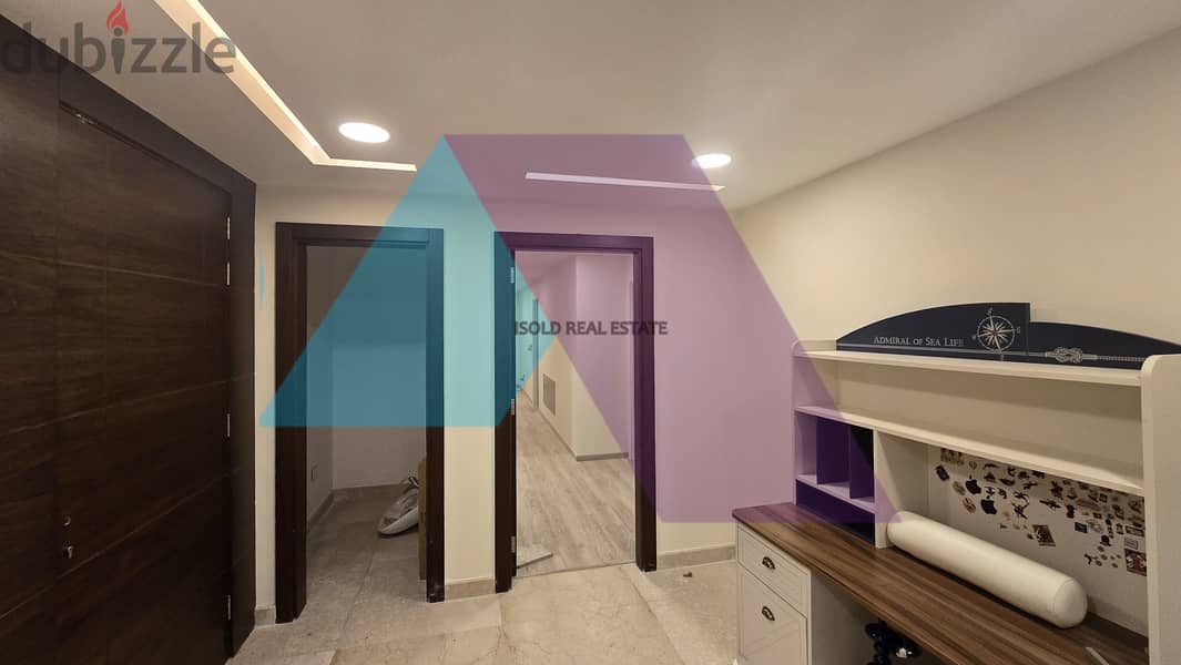 A Decorated 320 m2 apartment with 70m2 terrace for sale in Rihaniyeh 5